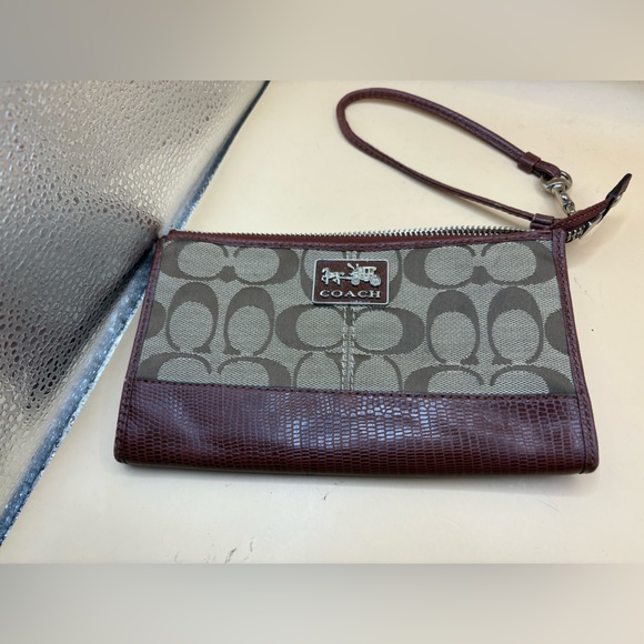 Coach Handbags - brown signature c coach clutch